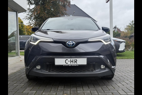 Toyota C-HR 1.8 Hybrid Bi-Tone Plus | Leer, Stoel + Stuurverwarming, Navigatie, Dodehoekherkenning, Parkeersensoren