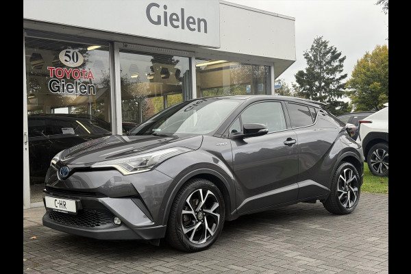 Toyota C-HR 1.8 Hybrid Bi-Tone Plus | Leer, Stoel + Stuurverwarming, Navigatie, Dodehoekherkenning, Parkeersensoren