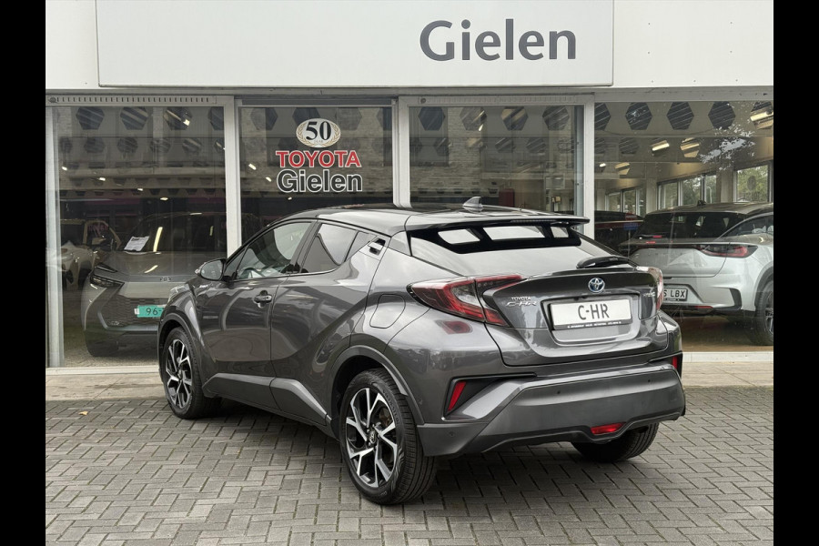 Toyota C-HR 1.8 Hybrid Bi-Tone Plus | Leer, Stoel + Stuurverwarming, Navigatie, Dodehoekherkenning, Parkeersensoren