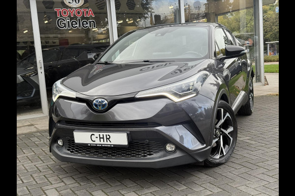 Toyota C-HR 1.8 Hybrid Bi-Tone Plus | Leer, Stoel + Stuurverwarming, Navigatie, Dodehoekherkenning, Parkeersensoren