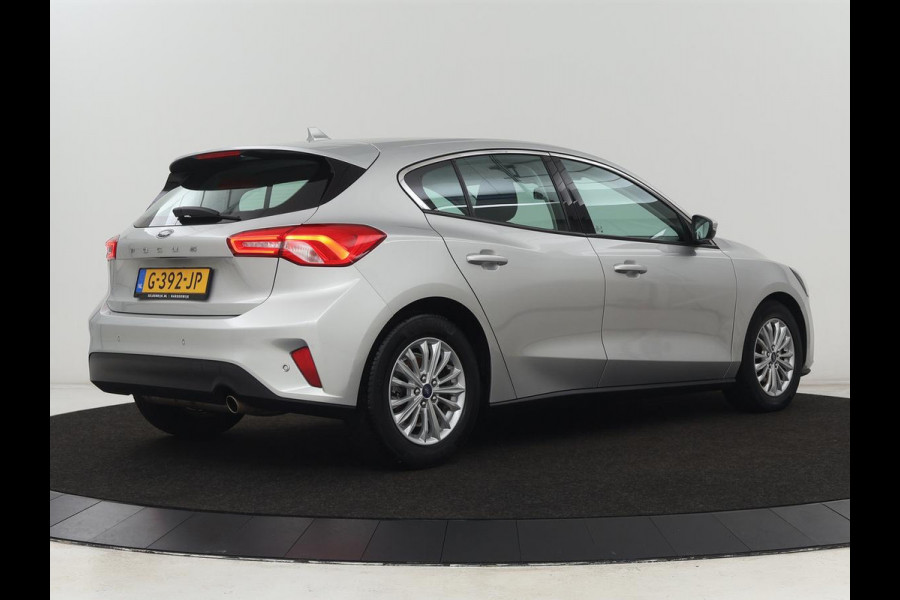 Ford Focus 1.0 EcoBoost Titanium | Automaat | Carplay | Navigatie | Keyless | Parkeerhulp | Climate control | Cruise control | Bluetooth Ford Focus 1.0 EcoBoost Titanium | Automaat | Carplay | Navigatie | Keyless | Parkeerhulp | Climate control | Cruise control | Bluetooth