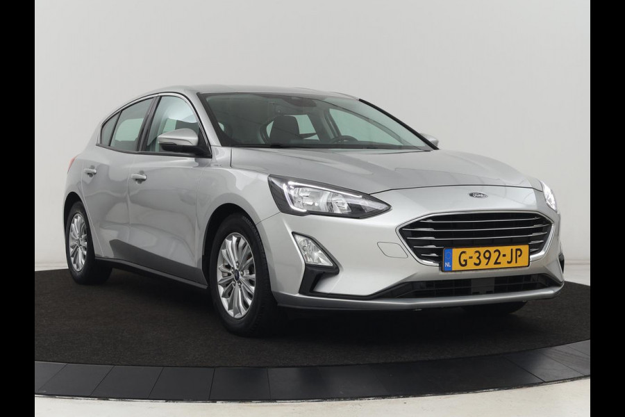 Ford Focus 1.0 EcoBoost Titanium | Automaat | Carplay | Navigatie | Keyless | Parkeerhulp | Climate control | Cruise control | Bluetooth Ford Focus 1.0 EcoBoost Titanium | Automaat | Carplay | Navigatie | Keyless | Parkeerhulp | Climate control | Cruise control | Bluetooth