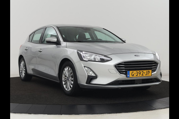 Ford Focus 1.0 EcoBoost Titanium | Automaat | Carplay | Navigatie | Keyless | Parkeerhulp | Climate control | Cruise control | Bluetooth Ford Focus 1.0 EcoBoost Titanium | Automaat | Carplay | Navigatie | Keyless | Parkeerhulp | Climate control | Cruise control | Bluetooth