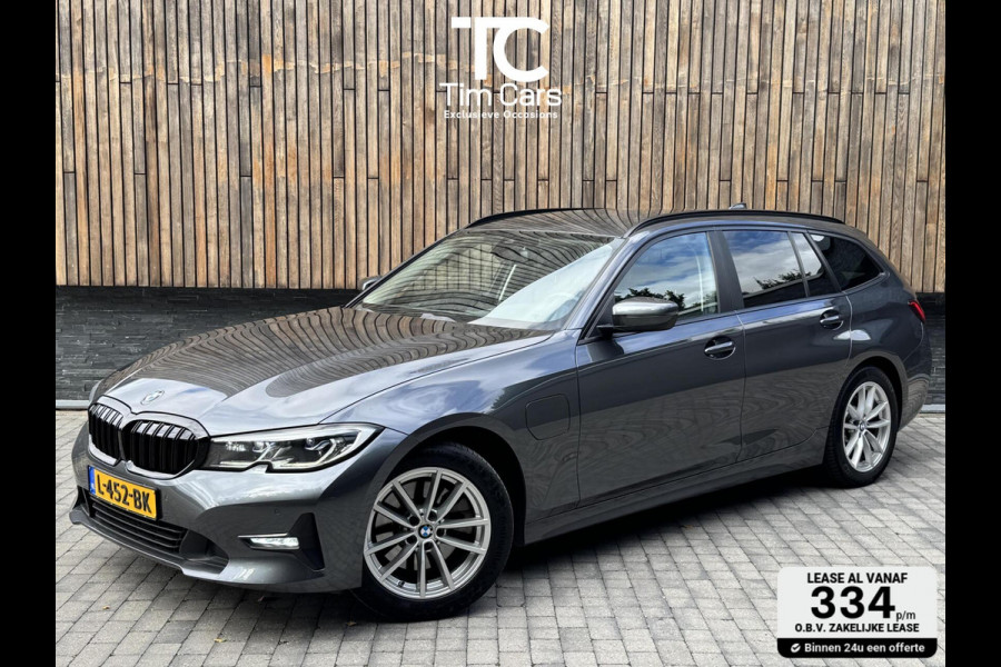 BMW 3 Serie Touring 320e High Executive Automaat | Trekhaak elektrisch | Navigatiesysteem | Laser LED | Draadloze telefoonlader | Apple CarP