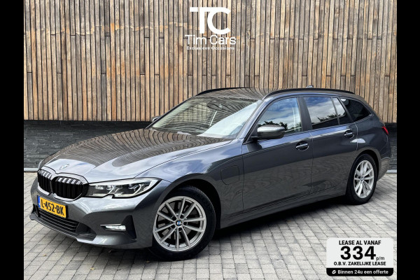 BMW 3 Serie Touring 320e High Executive Automaat | Trekhaak elektrisch | Navigatiesysteem | Laser LED | Draadloze telefoonlader | Apple CarP