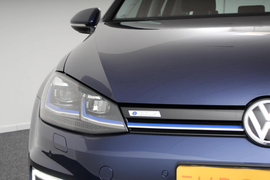 Volkswagen e-Golf Edition | Navigatie | Digitale Cockpit | Apple Carplay/Android Auto | Bluetooth | Cruise control adaptive | Lichtmetalen Velgen 17" | Camera | Parkeer sensoren | Stoelverwarming Volkswagen e-Golf Edition | Navigatie | Digitale Cockpit | Apple Carplay/Android Auto | Bluetooth | Cruise control adaptive | Lichtmetalen Velgen 17" | Camera | Parkeer sensoren | Stoelverwarming