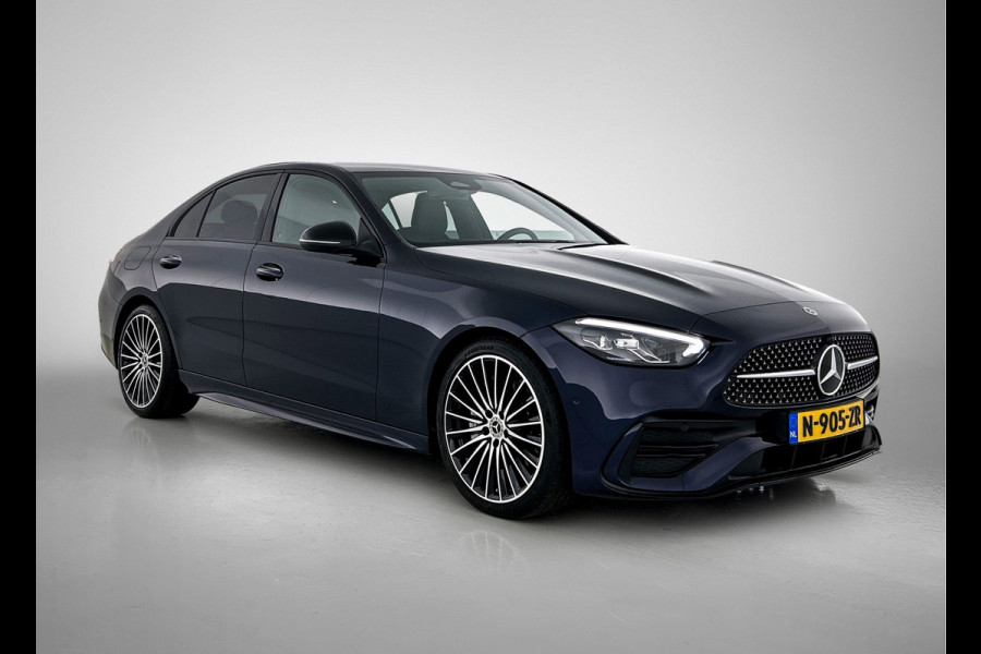 Mercedes-Benz C-Klasse 180 AMG Line Multispaaks lichtmetalen velgen 19 inch. Navigatie | parking support met camera achter | Inclusief 24 maanden MB Certified garantie voor Europa.