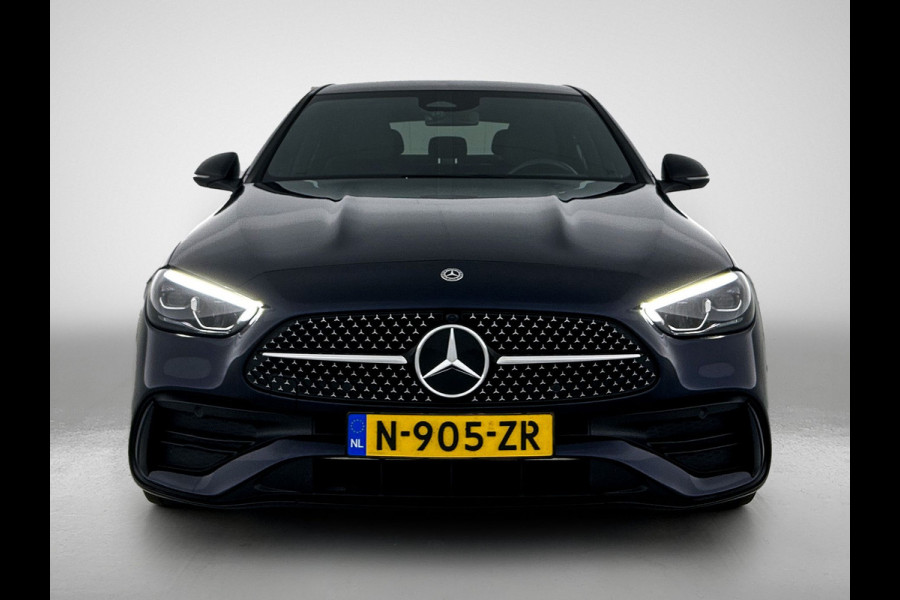 Mercedes-Benz C-Klasse 180 AMG Line Multispaaks lichtmetalen velgen 19 inch. Navigatie | parking support met camera achter | Inclusief 24 maanden MB Certified garantie voor Europa.