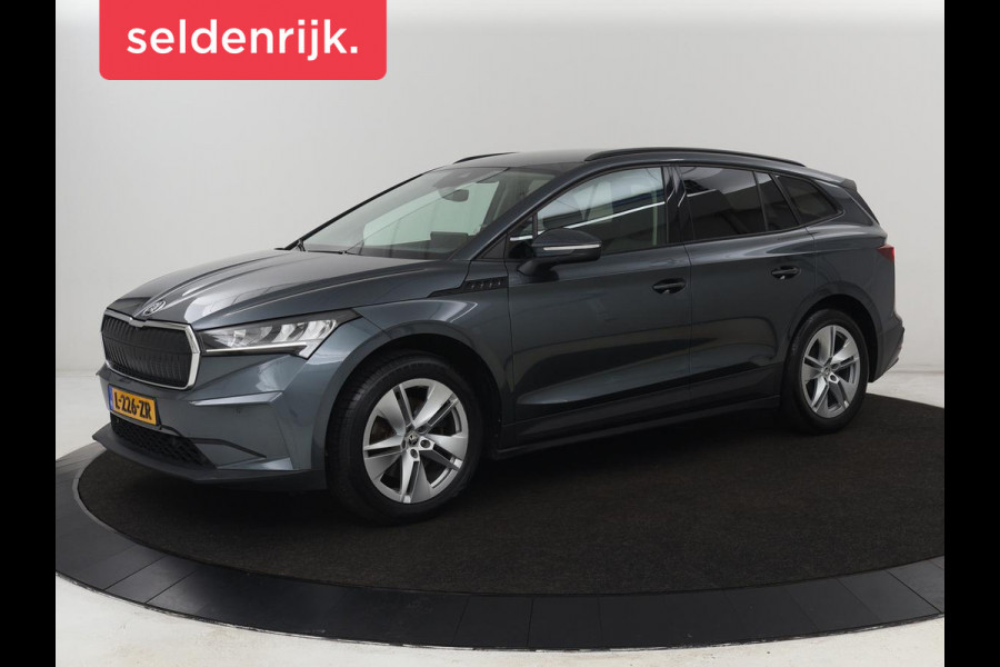 Škoda ENYAQ iV 60 | Trekhaak | Adaptive cruise | Camera | Keyless | Stuurverwarming | Half leder | 19'' | Carplay | Navigatie | Digital Cockpit | Full LED | File Assistent | Parkeerhulp