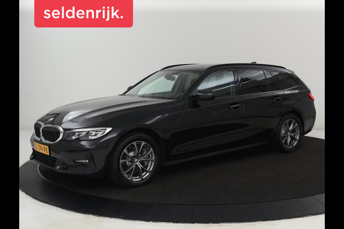BMW 3 Serie Touring 330e | Trekhaak | Half Leder | Stoel & Stuurverwarming | Sfeerverlichting | Carplay | Sportstoelen | Navigatie | Cruise Control | Parkeerhulp | Live Cockpit | PHEV | Plug In BMW 3 Serie Touring 330e | Trekhaak | Half Leder | Stoel & Stuurverwarming | Sfeerverlichting | Carplay | Sportstoelen | Navigatie | Cruise Control | Parkeerhulp | Live Cockpit | PHEV | Plug In