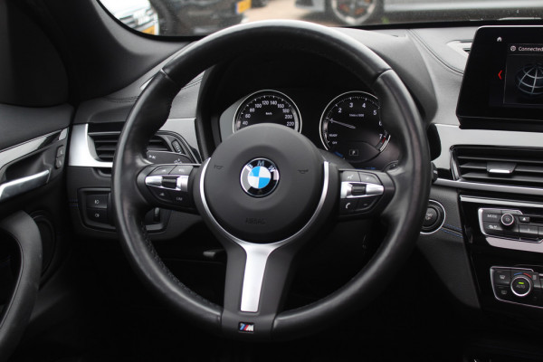 BMW X1 sDrive20i High Executive Ed. / Trekhaak / Panoramadak / Camera / Head-up / 19'' / Memory seats / Leder / Stuurverwarming / Navigatie / DAB / Stoelverwarming / Cruise Control BMW X1 sDrive20i High Executive Ed. / Trekhaak / Panoramadak / Camera / Head-up / 19'' / Memory seats / Leder / Stuurverwarming / Navigatie / DAB / Stoelverwarming / Cruise Control