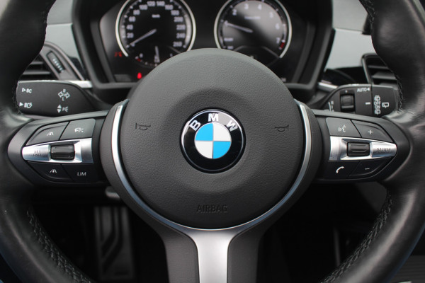 BMW X1 sDrive20i High Executive Ed. / Trekhaak / Panoramadak / Camera / Head-up / 19'' / Memory seats / Leder / Stuurverwarming / Navigatie / DAB / Stoelverwarming / Cruise Control BMW X1 sDrive20i High Executive Ed. / Trekhaak / Panoramadak / Camera / Head-up / 19'' / Memory seats / Leder / Stuurverwarming / Navigatie / DAB / Stoelverwarming / Cruise Control