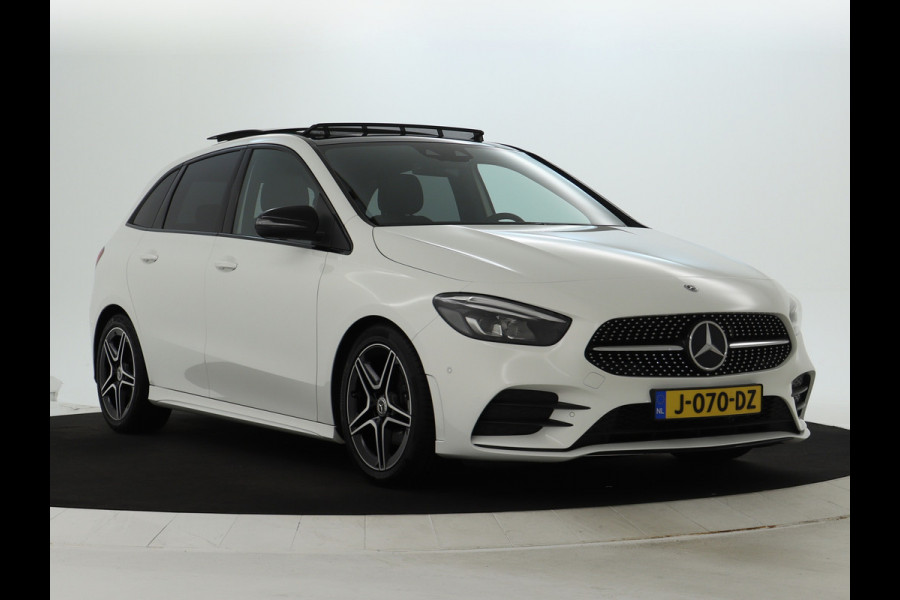 Mercedes-Benz B-Klasse 180 Business Solution AMG | Panoramadak | Achteruitrijcamera | Nightpakket | Apple Carplay | Inclusief 24 maanden MB Certified garantie voor Europa. Mercedes-Benz B-Klasse 180 Business Solution AMG | Panoramadak | Achteruitrijcamera | Nightpakket | Apple Carplay | Inclusief 24 maanden MB Certified garantie voor Europa.