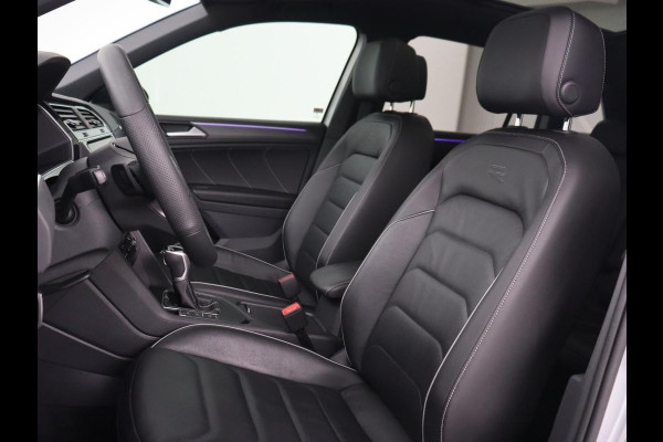 Volkswagen Tiguan 1.4 TSI eHybrid R-Line | Panoramadak | Leder | Trekhaak | 360 Camera | Sfeerverlichting | Adaptive cruise | 20'' | Carplay | Adaptief onderstel | Matrix LED | Park Assist | PHEV | Plug In Volkswagen Tiguan 1.4 TSI eHybrid R-Line | Panoramadak | Leder | Trekhaak | 360 Camera | Sfeerverlichting | Adaptive cruise | 20'' | Carplay | Adaptief onderstel | Matrix LED | Park Assist | PHEV | Plug In