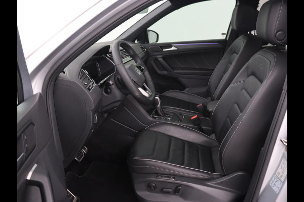 Volkswagen Tiguan 1.4 TSI eHybrid R-Line | Panoramadak | Leder | Trekhaak | 360 Camera | Sfeerverlichting | Adaptive cruise | 20'' | Carplay | Adaptief onderstel | Matrix LED | Park Assist | PHEV | Plug In Volkswagen Tiguan 1.4 TSI eHybrid R-Line | Panoramadak | Leder | Trekhaak | 360 Camera | Sfeerverlichting | Adaptive cruise | 20'' | Carplay | Adaptief onderstel | Matrix LED | Park Assist | PHEV | Plug In