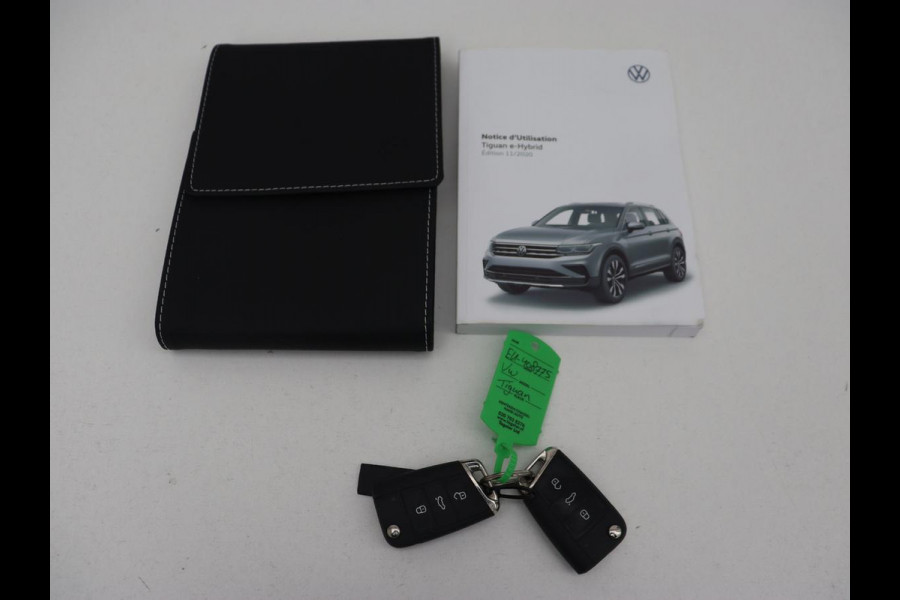 Volkswagen Tiguan 1.4 TSI eHybrid R-Line | Panoramadak | Leder | Trekhaak | 360 Camera | Sfeerverlichting | Adaptive cruise | 20'' | Carplay | Adaptief onderstel | Matrix LED | Park Assist | PHEV | Plug In Volkswagen Tiguan 1.4 TSI eHybrid R-Line | Panoramadak | Leder | Trekhaak | 360 Camera | Sfeerverlichting | Adaptive cruise | 20'' | Carplay | Adaptief onderstel | Matrix LED | Park Assist | PHEV | Plug In