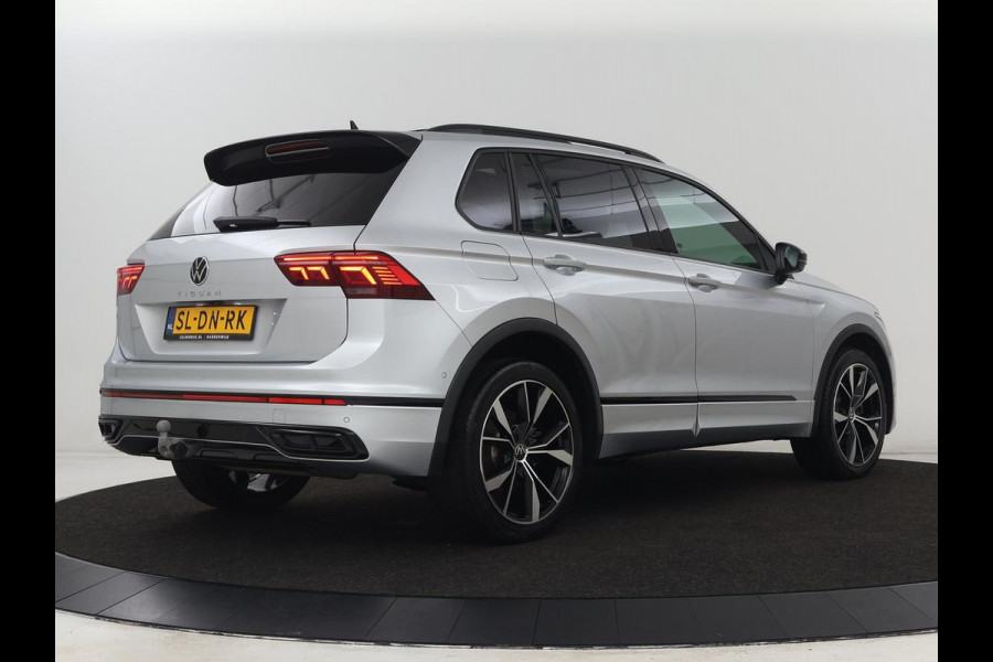 Volkswagen Tiguan 1.4 TSI eHybrid R-Line | Panoramadak | Leder | Trekhaak | 360 Camera | Sfeerverlichting | Adaptive cruise | 20'' | Carplay | Adaptief onderstel | Matrix LED | Park Assist | PHEV | Plug In Volkswagen Tiguan 1.4 TSI eHybrid R-Line | Panoramadak | Leder | Trekhaak | 360 Camera | Sfeerverlichting | Adaptive cruise | 20'' | Carplay | Adaptief onderstel | Matrix LED | Park Assist | PHEV | Plug In