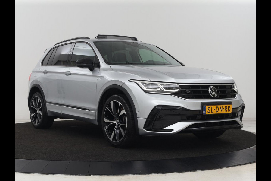 Volkswagen Tiguan 1.4 TSI eHybrid R-Line | Panoramadak | Leder | Trekhaak | 360 Camera | Sfeerverlichting | Adaptive cruise | 20'' | Carplay | Adaptief onderstel | Matrix LED | Park Assist | PHEV | Plug In Volkswagen Tiguan 1.4 TSI eHybrid R-Line | Panoramadak | Leder | Trekhaak | 360 Camera | Sfeerverlichting | Adaptive cruise | 20'' | Carplay | Adaptief onderstel | Matrix LED | Park Assist | PHEV | Plug In