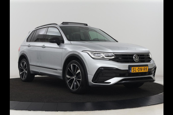 Volkswagen Tiguan 1.4 TSI eHybrid R-Line | Panoramadak | Leder | Trekhaak | 360 Camera | Sfeerverlichting | Adaptive cruise | 20'' | Carplay | Adaptief onderstel | Matrix LED | Park Assist | PHEV | Plug In Volkswagen Tiguan 1.4 TSI eHybrid R-Line | Panoramadak | Leder | Trekhaak | 360 Camera | Sfeerverlichting | Adaptive cruise | 20'' | Carplay | Adaptief onderstel | Matrix LED | Park Assist | PHEV | Plug In