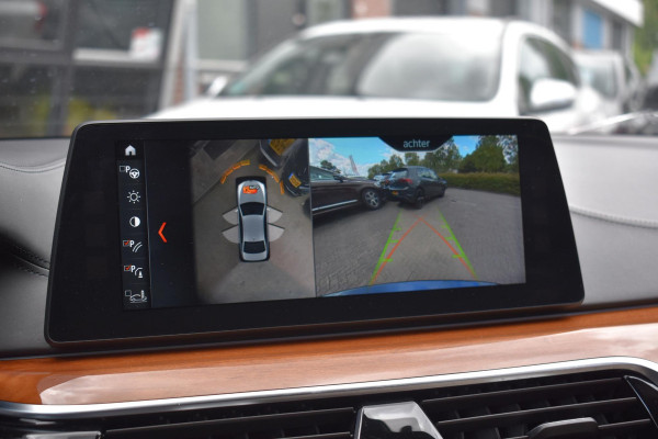 BMW 5 Serie M550i xDrive High Executive HUD Pano Lane ACC B&W Sfeer