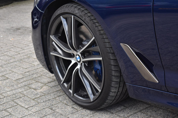 BMW 5 Serie M550i xDrive High Executive HUD Pano Lane ACC B&W Sfeer