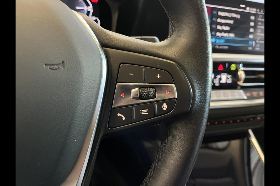 BMW 3 Serie Touring 320e Sportline Aut-8 Panoramadak Head Up Display Laser Licht Adaptive Cruise Trekhaak Leder Navi Parkeer Sensoren