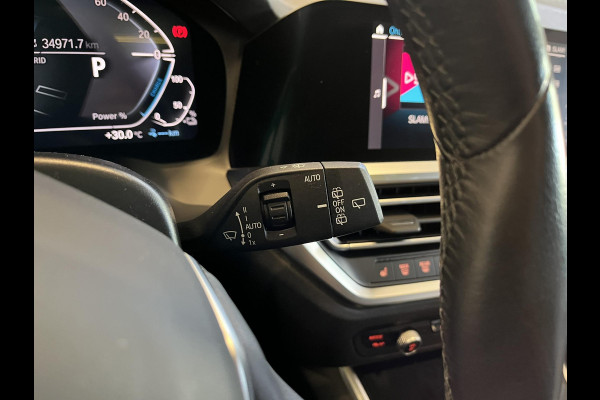 BMW 3 Serie Touring 320e Sportline Aut-8 Panoramadak Head Up Display Laser Licht Adaptive Cruise Trekhaak Leder Navi Parkeer Sensoren