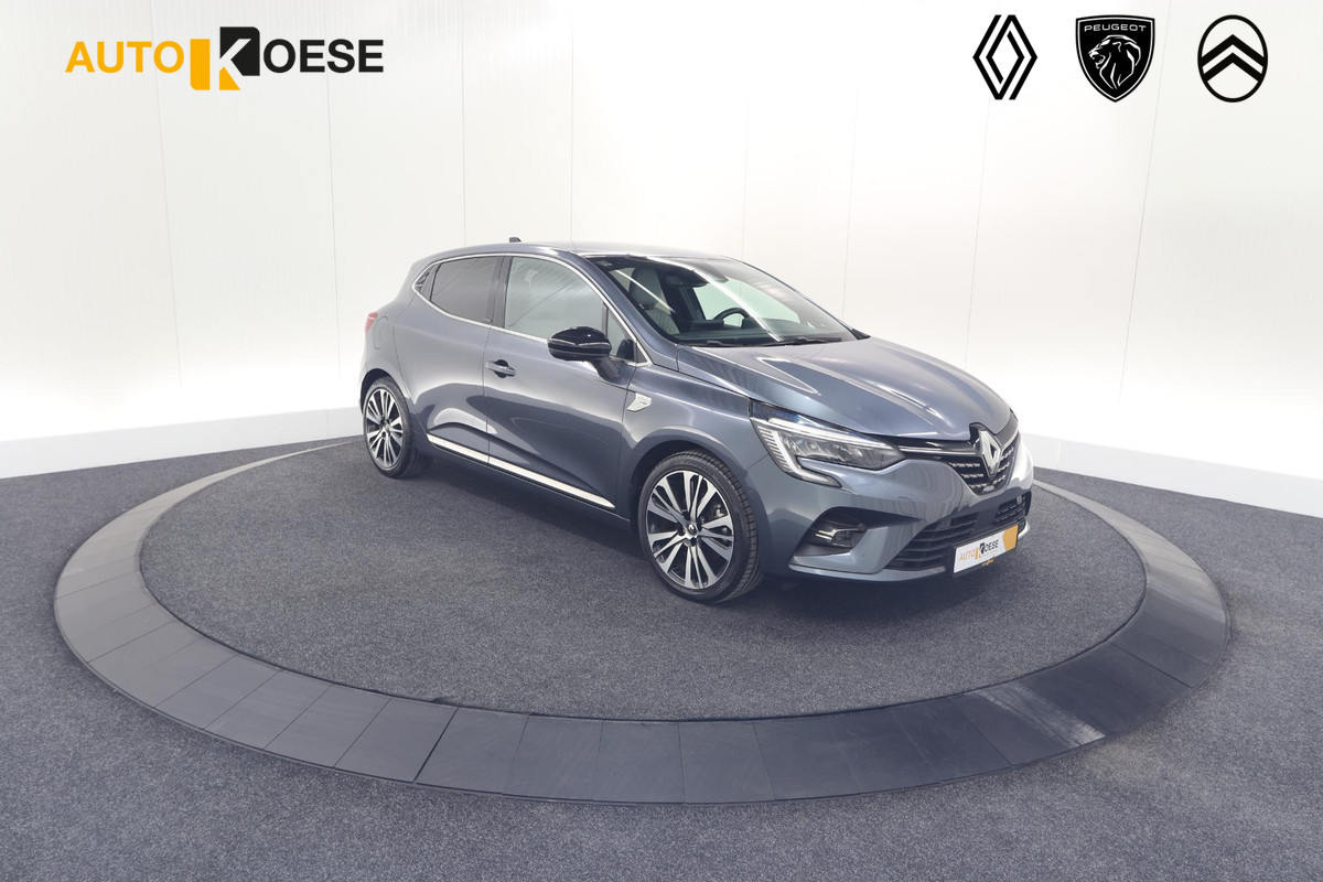 Renault Clio 1.6 E-Tech Hybrid 140 Initiale Paris | Trekhaak | Rondom Camerazicht | Adaptieve Cruise Control | Stoelverwarming Renault Clio 1.6 E-Tech Hybrid 140 Initiale Paris | Trekhaak | Rondom Camerazicht | Adaptieve Cruise Control | Stoelverwarming