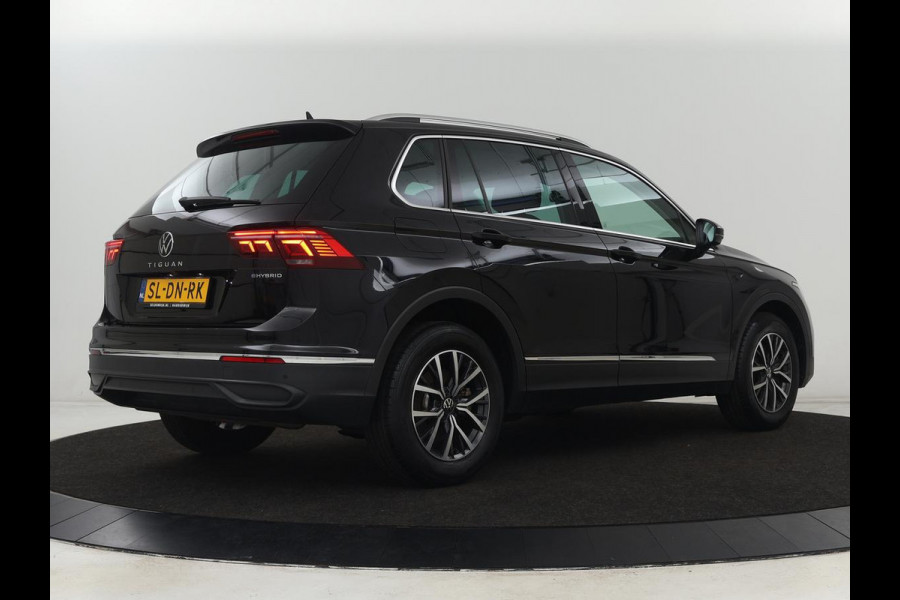 Volkswagen Tiguan 1.4 TSI eHybrid Style | Stoelverwarming | Camera | Adaptive cruise | Carplay | Sfeerverlichting | Full LED | Navigatie | Park Assist | DAB | Stuurverwarming | PHEV | Plug In Volkswagen Tiguan 1.4 TSI eHybrid Style | Stoelverwarming | Camera | Adaptive cruise | Carplay | Sfeerverlichting | Full LED | Navigatie | Park Assist | DAB | Stuurverwarming | PHEV | Plug In