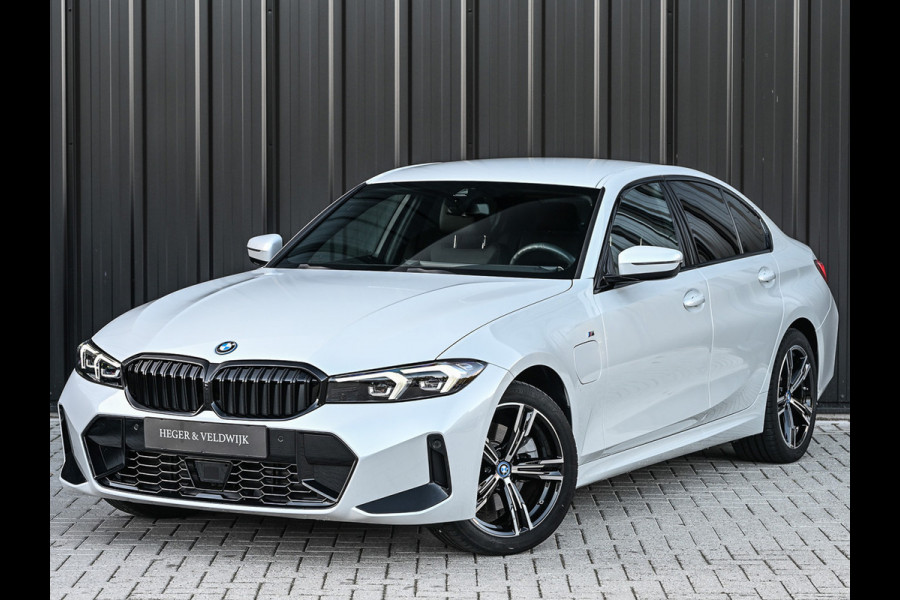 BMW 3-serie 330e | M-SPORT | SPORT SEATS | AMBIANCE INTERIEUR | ACTIVE CRUISE | DAB+ | HIFI SOUND | SHADOW-LINE | TREKHAAK | STUURVERWARMING BMW 3-serie 330e | M-SPORT | SPORT SEATS | AMBIANCE INTERIEUR | ACTIVE CRUISE | DAB+ | HIFI SOUND | SHADOW-LINE | TREKHAAK | STUURVERWARMING