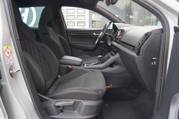 Škoda Karoq 1.5 TSI ACT Sportline Business *EERSTE EIGENAAR* + KEYLESS / CAMERA / CANTON AUDIO / TREKHAAK Škoda Karoq 1.5 TSI ACT Sportline Business *EERSTE EIGENAAR* + KEYLESS / CAMERA / CANTON AUDIO / TREKHAAK