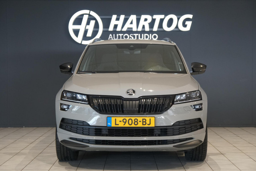 Škoda Karoq 1.5 TSI ACT Sportline Business *EERSTE EIGENAAR* + KEYLESS / CAMERA / CANTON AUDIO / TREKHAAK Škoda Karoq 1.5 TSI ACT Sportline Business *EERSTE EIGENAAR* + KEYLESS / CAMERA / CANTON AUDIO / TREKHAAK