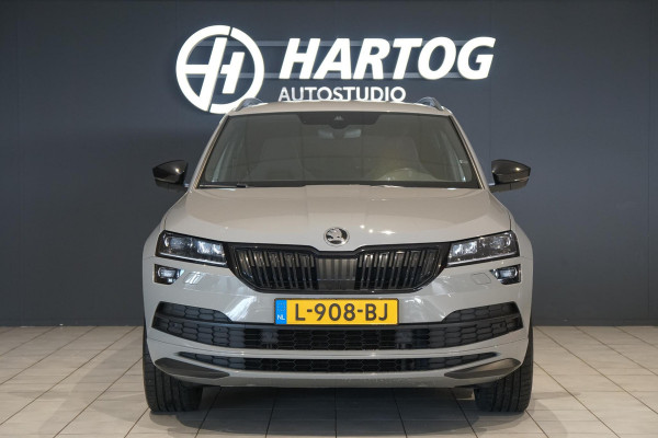 Škoda Karoq 1.5 TSI ACT Sportline Business *EERSTE EIGENAAR* + KEYLESS / CAMERA / CANTON AUDIO / TREKHAAK Škoda Karoq 1.5 TSI ACT Sportline Business *EERSTE EIGENAAR* + KEYLESS / CAMERA / CANTON AUDIO / TREKHAAK