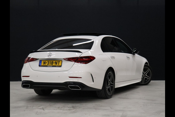 Mercedes-Benz C-Klasse 200 4MATIC AMG Line [SCHUIFKANTELDAK, ADAPTIVE CRUISE CONTROL, BURMESTER, ELEKTRISCHE STOELEN, 360 CAMERA, SFEERLICHT, CARBON, URBAN GUARD+,  NIEUWSTAAT]