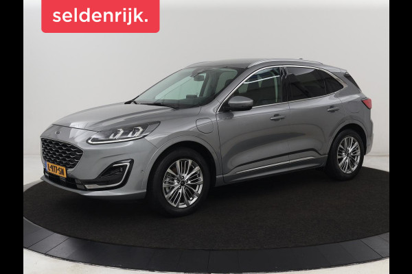 Ford Kuga 2.5 PHEV Vignale | Head-Up | Trekhaak | Adaptive cruise | Leder | 360 Camera | Stoelverwarming | Digital Cockpit | Carplay | Dodehoek detectie | Navigatie | Keyless | Achterbankverwarming | Plug In