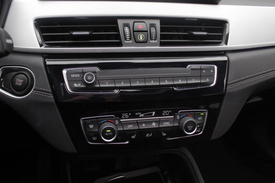 BMW X1 sDrive18i High Exe. M Sport / Trekhaak / Half leder / Navi. Proff / Parkeerhulp V+a / 18'' / Stoelverwarming / DAB / Cruise Control BMW X1 sDrive18i High Exe. M Sport / Trekhaak / Half leder / Navi. Proff / Parkeerhulp V+a / 18'' / Stoelverwarming / DAB / Cruise Control