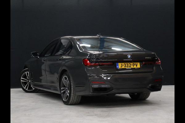 BMW 7 Serie 745e High Executive M Sport [SCHUIFKANTELDAK, HARMAN/KARDON, APPLE CARPLAY, ANDROID, ELEKTRISCH VERSTELBARE STOELEN V+A, STOELMASSAGE V+A, LUCHTVERING, 360 CAMERA, HEAD-UP, STUURVERWARMING, STOELVERKOELING, STOELVERWARM BMW 7 Serie 745e High Executive M Sport [SCHUIFKANTELDAK, HARMAN/KARDON, APPLE CARPLAY, ANDROID, ELEKTRISCH VERSTELBARE STOELEN V+A, STOELMASSAGE V+A, LUCHTVERING, 360 CAMERA, HEAD-UP, STUURVERWARMING, STOELVERKOELING, STOELVERWARM