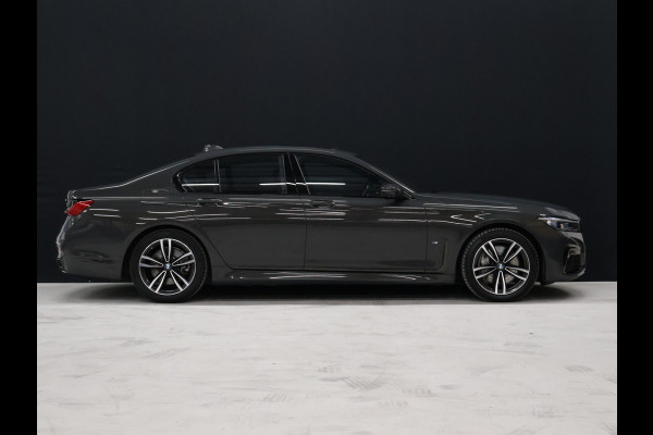 BMW 7 Serie 745e High Executive M Sport [SCHUIFKANTELDAK, HARMAN/KARDON, APPLE CARPLAY, ANDROID, ELEKTRISCH VERSTELBARE STOELEN V+A, STOELMASSAGE V+A, LUCHTVERING, 360 CAMERA, HEAD-UP, STUURVERWARMING, STOELVERKOELING, STOELVERWARM BMW 7 Serie 745e High Executive M Sport [SCHUIFKANTELDAK, HARMAN/KARDON, APPLE CARPLAY, ANDROID, ELEKTRISCH VERSTELBARE STOELEN V+A, STOELMASSAGE V+A, LUCHTVERING, 360 CAMERA, HEAD-UP, STUURVERWARMING, STOELVERKOELING, STOELVERWARM