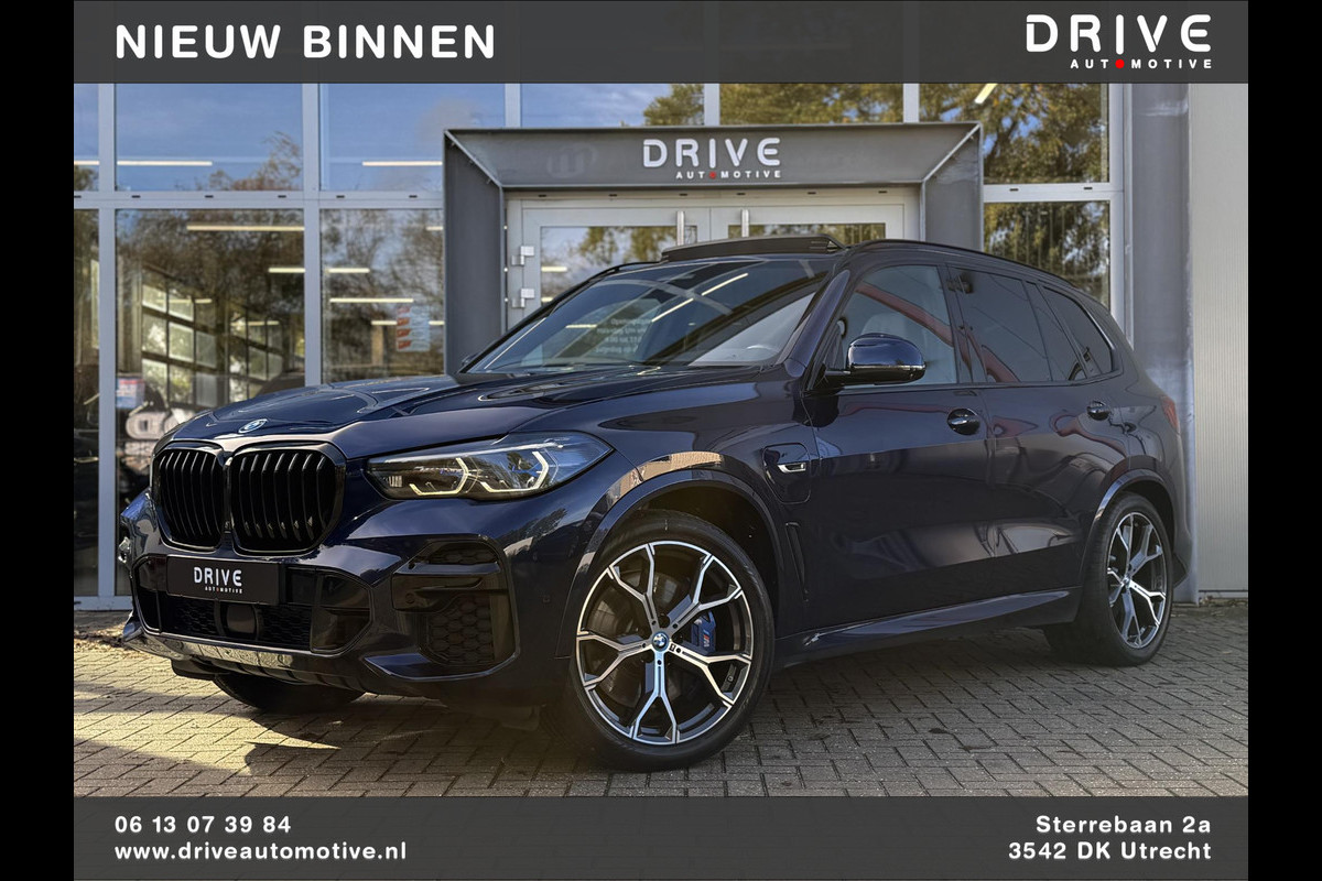 BMW X5 xDrive45e High Ex. M-Sport|Individual|SOH93%|Pano|Laser|CoPilot|21"|HUD|HIFI|Trekhaak|Tansanit BMW X5 xDrive45e High Ex. M-Sport|Individual|SOH93%|Pano|Laser|CoPilot|21"|HUD|HIFI|Trekhaak|Tansanit