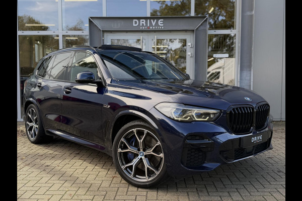 BMW X5 xDrive45e High Ex. M-Sport|Individual|SOH93%|Pano|Laser|CoPilot|21"|HUD|HIFI|Trekhaak|Tansanit BMW X5 xDrive45e High Ex. M-Sport|Individual|SOH93%|Pano|Laser|CoPilot|21"|HUD|HIFI|Trekhaak|Tansanit