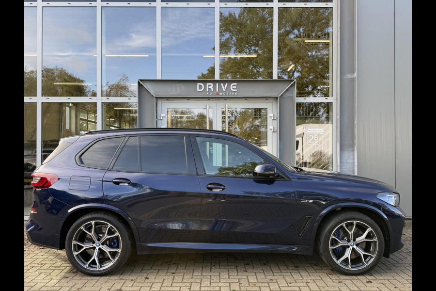 BMW X5 xDrive45e High Ex. M-Sport|Individual|SOH93%|Pano|Laser|CoPilot|21"|HUD|HIFI|Trekhaak|Tansanit BMW X5 xDrive45e High Ex. M-Sport|Individual|SOH93%|Pano|Laser|CoPilot|21"|HUD|HIFI|Trekhaak|Tansanit