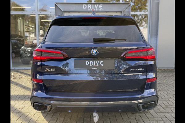 BMW X5 xDrive45e High Ex. M-Sport|Individual|SOH93%|Pano|Laser|CoPilot|21"|HUD|HIFI|Trekhaak|Tansanit BMW X5 xDrive45e High Ex. M-Sport|Individual|SOH93%|Pano|Laser|CoPilot|21"|HUD|HIFI|Trekhaak|Tansanit