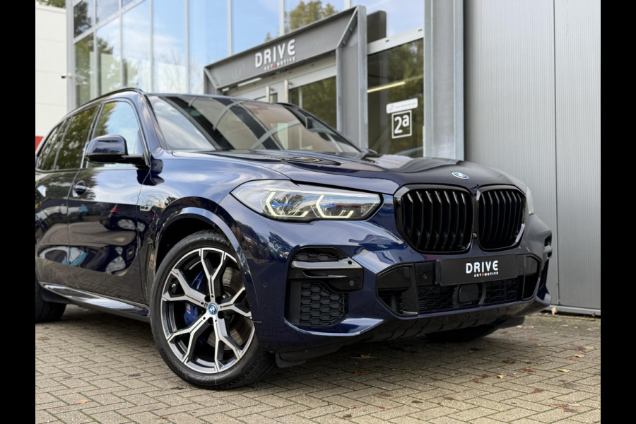BMW X5 xDrive45e High Ex. M-Sport|Individual|SOH93%|Pano|Laser|CoPilot|21"|HUD|HIFI|Trekhaak|Tansanit BMW X5 xDrive45e High Ex. M-Sport|Individual|SOH93%|Pano|Laser|CoPilot|21"|HUD|HIFI|Trekhaak|Tansanit