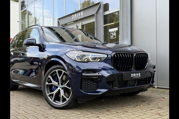 BMW X5 xDrive45e High Ex. M-Sport|Individual|SOH93%|Pano|Laser|CoPilot|21"|HUD|HIFI|Trekhaak|Tansanit BMW X5 xDrive45e High Ex. M-Sport|Individual|SOH93%|Pano|Laser|CoPilot|21"|HUD|HIFI|Trekhaak|Tansanit