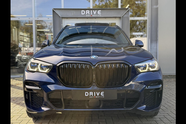 BMW X5 xDrive45e High Ex. M-Sport|Individual|SOH93%|Pano|Laser|CoPilot|21"|HUD|HIFI|Trekhaak|Tansanit BMW X5 xDrive45e High Ex. M-Sport|Individual|SOH93%|Pano|Laser|CoPilot|21"|HUD|HIFI|Trekhaak|Tansanit