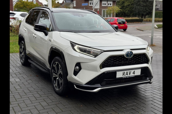Toyota RAV4 2.5 Plug-in Hybrid AWD Bi-Tone Plus | Trekhaak, Head up display, JBL, Leer, Geheugenfunctie, 360 camera, Stoel+stuurverwarming,