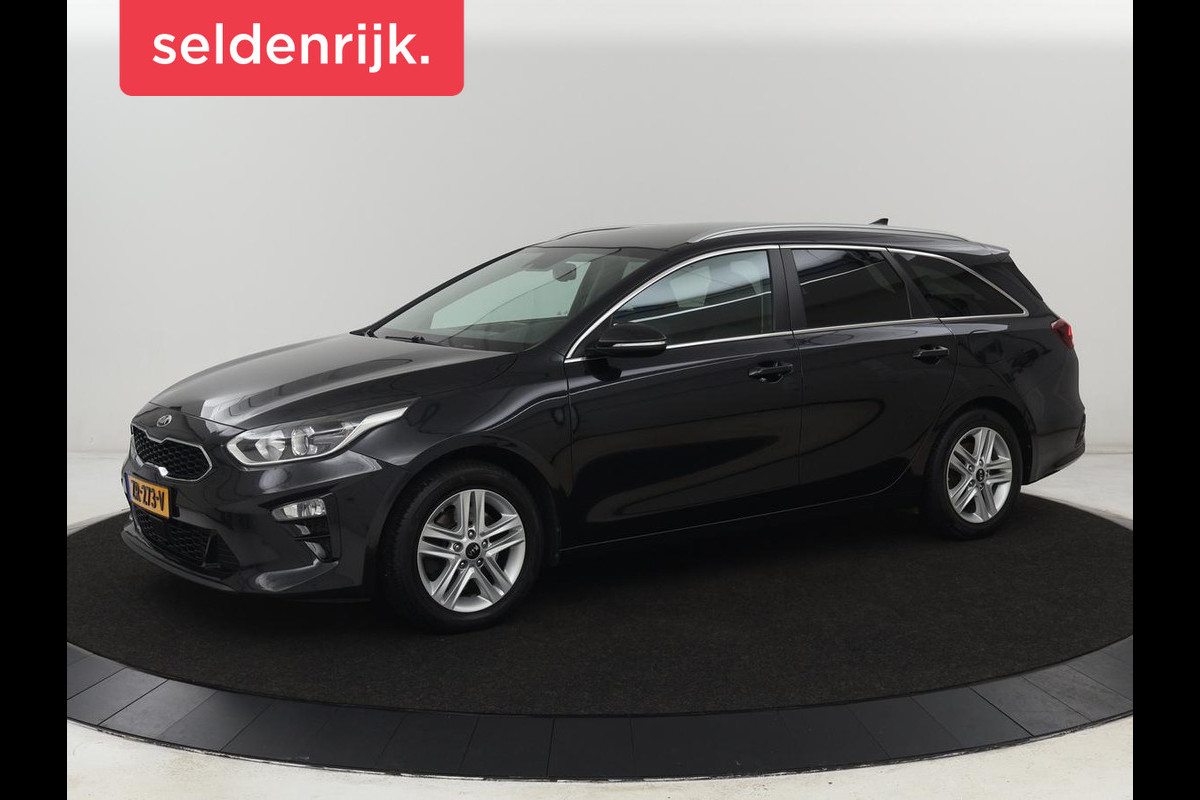 Kia Ceed 1.0 T-GDi DynamicPlusLine | Trekhaak | Stoel & stuurverwarming | Camera | Carplay | Navigatie | Climate control | Parkeerhulp | Cruise control | Half leder Kia Ceed 1.0 T-GDi DynamicPlusLine | Trekhaak | Stoel & stuurverwarming | Camera | Carplay | Navigatie | Climate control | Parkeerhulp | Cruise control | Half leder