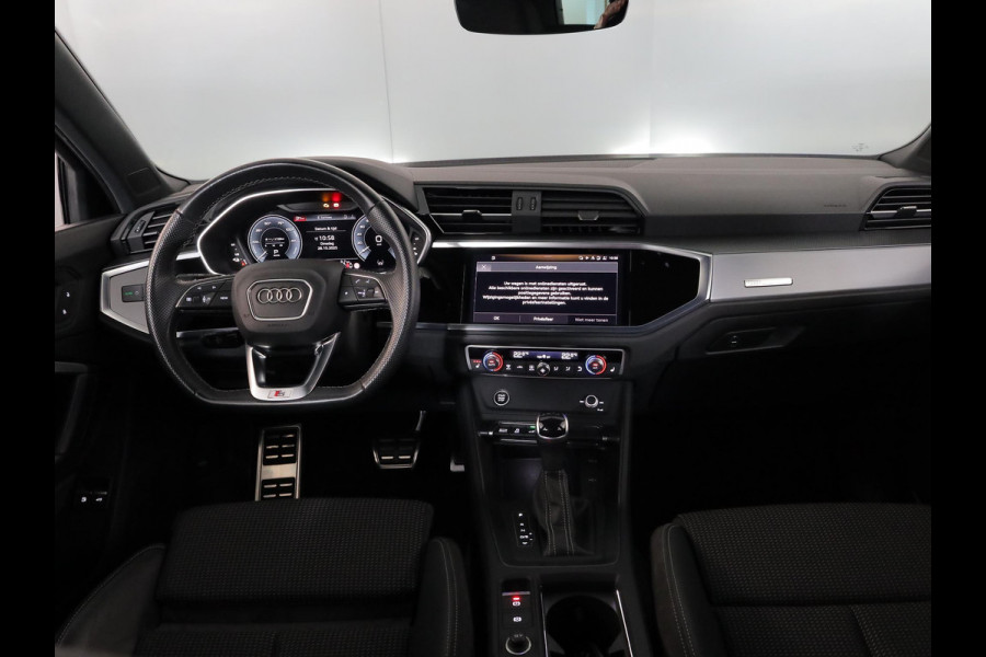 Audi Q3 45 TFSI e Business Edition 245 pk S-tronic | Navigatie | Parkeersensoren | Achteruitrijcamera | Adaptieve cruise control | Stoelverwarming | S-Line interieur |