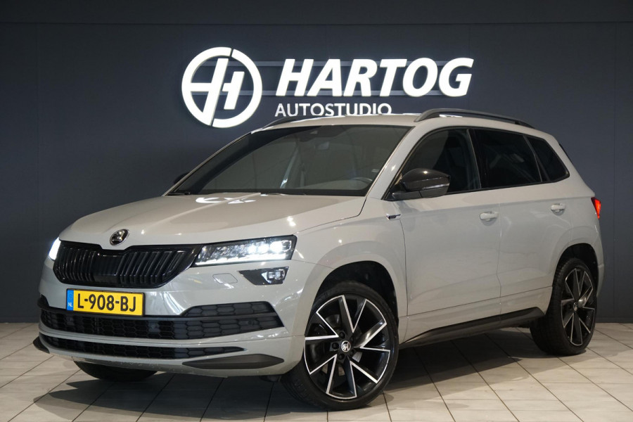 Škoda Karoq 1.5 TSI ACT Sportline Business *EERSTE EIGENAAR* + KEYLESS / CAMERA / CANTON AUDIO / TREKHAAK Škoda Karoq 1.5 TSI ACT Sportline Business *EERSTE EIGENAAR* + KEYLESS / CAMERA / CANTON AUDIO / TREKHAAK
