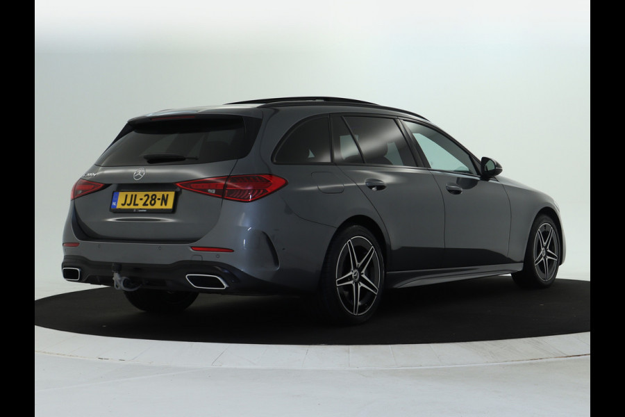 Mercedes-Benz C-Klasse Estate 300 e AMG Plug-In Hybride AMG Line | Night Pakket | Trekhaak | Panorama Schuif-Kanteldak | Memory Voorstoelen. Inclusief 24 maanden Mercedes-Benz Certified garantie voor Europa. Mercedes-Benz C-Klasse Estate 300 e AMG Plug-In Hybride AMG Line | Night Pakket | Trekhaak | Panorama Schuif-Kanteldak | Memory Voorstoelen. Inclusief 24 maanden Mercedes-Benz Certified garantie voor Europa.